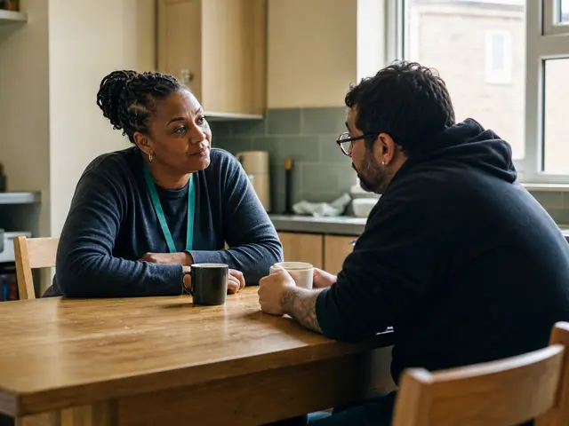 Resident having a supportive conversation at a kitchen table